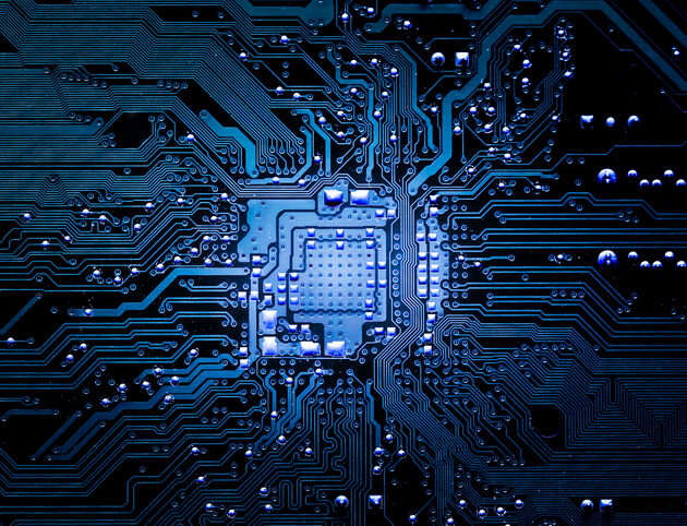 Closeup electronic circuit board background.